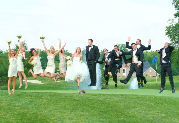 bridal party jumping simultaneously in wedding photo