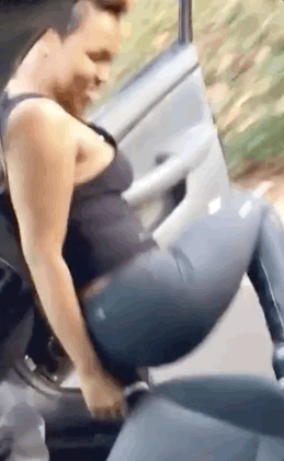 woman twerking and falling out of car
