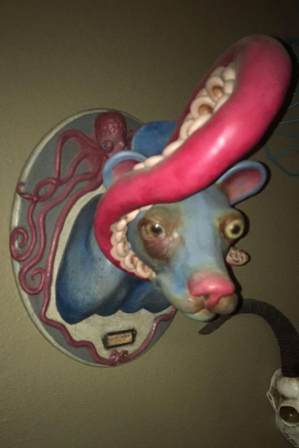 creepy dog squid art sculpture