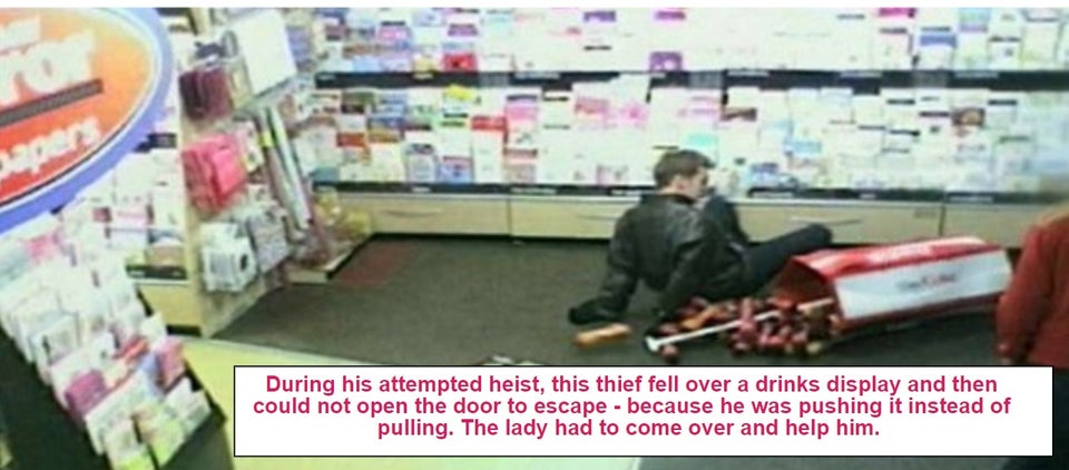 supermarket - During his attempted heist, this thief fell over a drinks display and then could not open the door to escape because he was pushing it instead of pulling. The lady had to come over and help him.