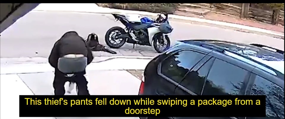 car - This thief's pants fell down while swiping a package from a doorstep