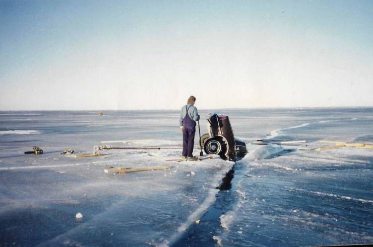 guy crashed his car through the ice in a frozen lake