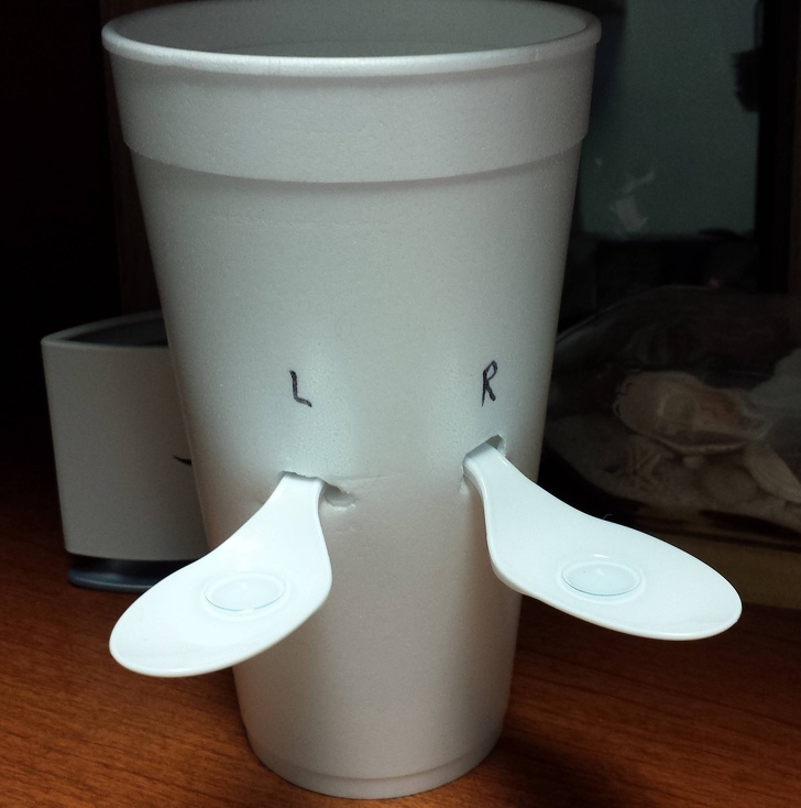 genius problem solvers - makeshift contact lens holder using styrofoam cup and plastic spoons