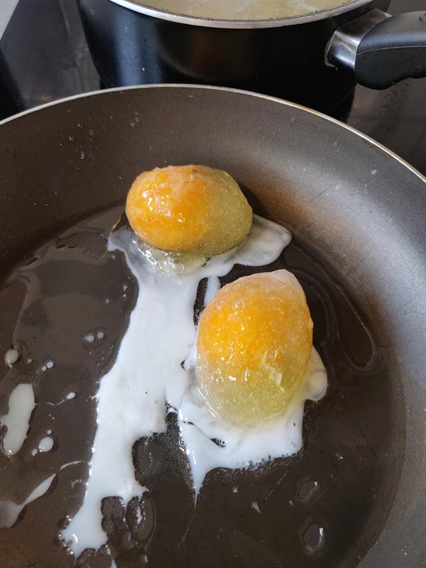 frozen egg yolks in pan