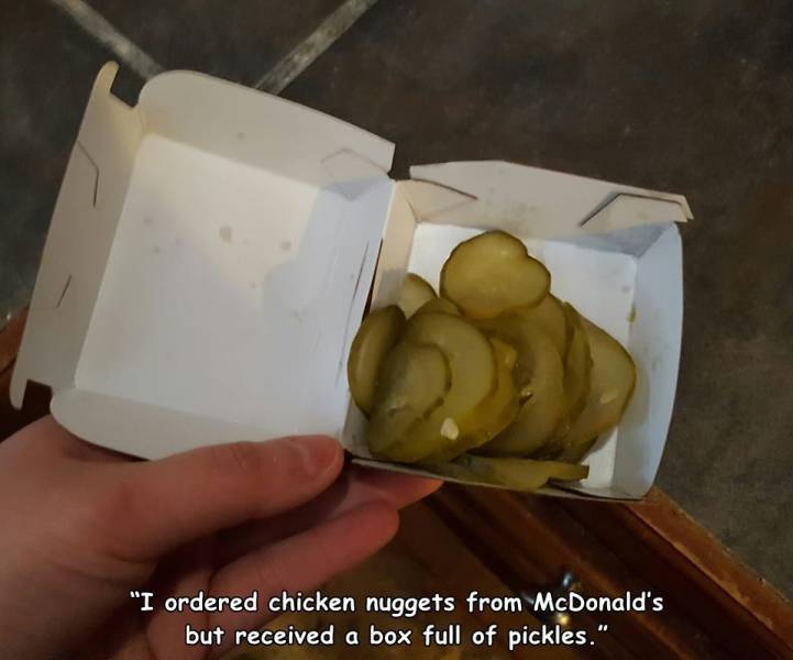 mcdonalds box of pickles - "I ordered chicken nuggets from McDonald's but received a box full of pickles."