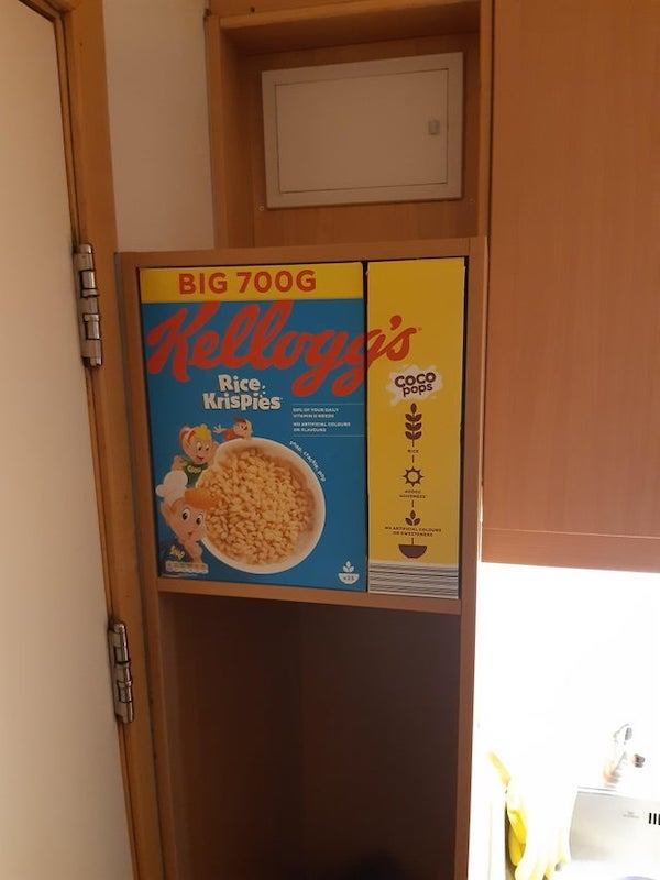 How perfectly our cereal boxes fit in this shelf in our dorm