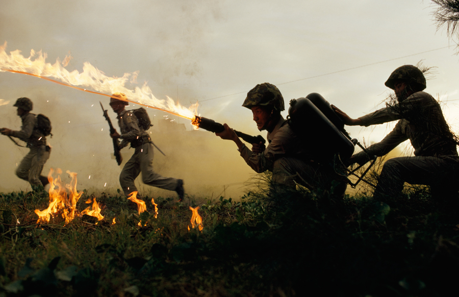 Marine infantry in Taiwan practice using flamethrowers in simulated battle. January 1969