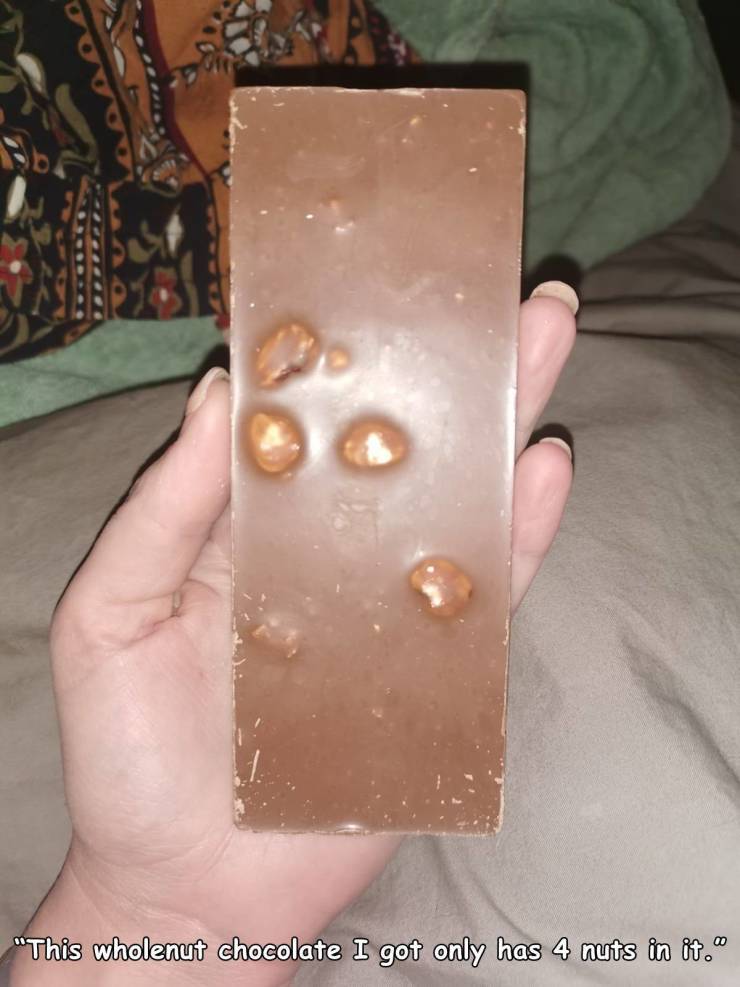 nail - "This wholenut chocolate I got only has 4 nuts in it."