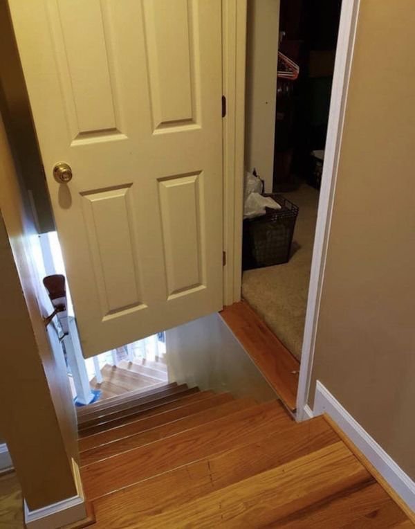 door that opens up onto a dangerous staircase
