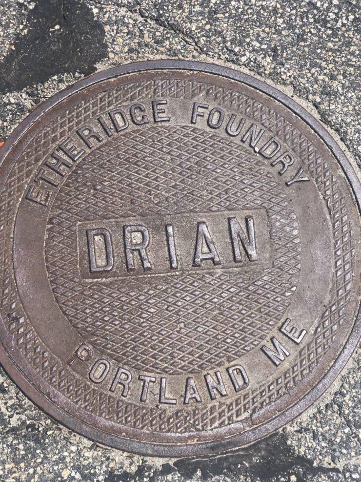 manhole cover that says drian instead of drain