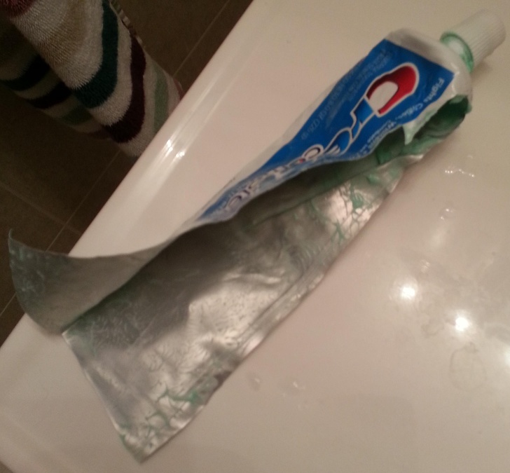 finished toothpaste cut open