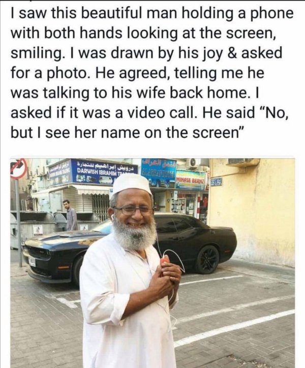 r mademesmile - I saw this beautiful man holding a phone with both hands looking at the screen, smiling. I was drawn by his joy & asked for a photo. He agreed, telling me he was talking to his wife back home. I asked if it was a video call. He said "No, b