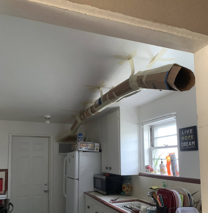 cardboard pipes to bring air conditioning into living room house