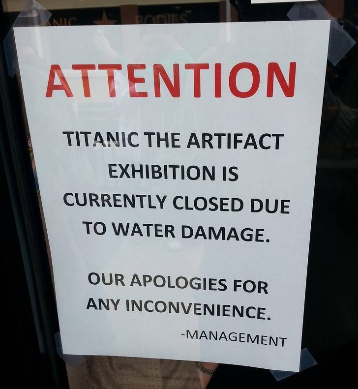 sign - Anic Attention Titanic The Artifact Exhibition Is Currently Closed Due To Water Damage. Our Apologies For Any Inconvenience. Management