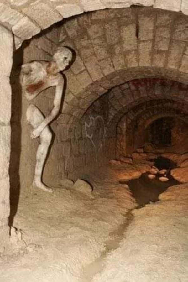 creepy paris catacombs