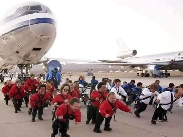 midgets pulling plane