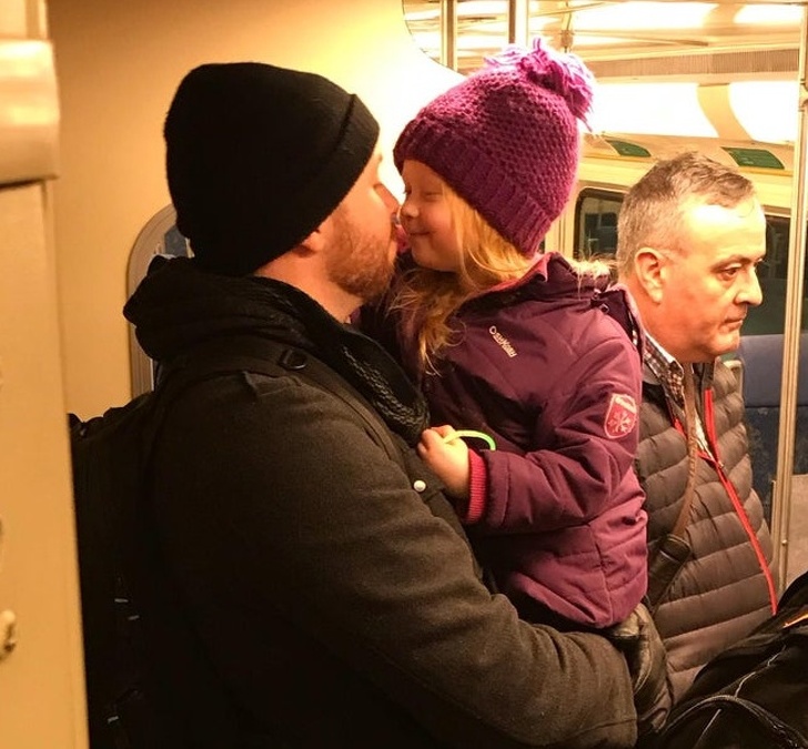 “My wife captured the moment of my daughter and me on the train while she was ’booping’ my nose with her’s. Pure happiness!”