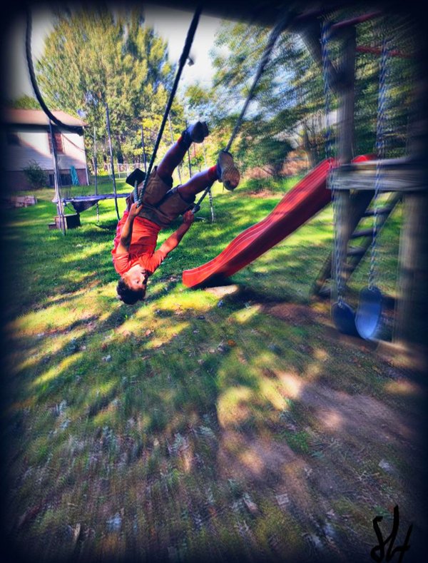 kid on swing falling upside down