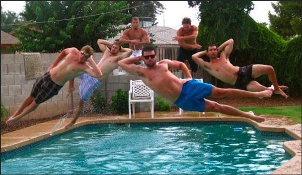 guys jumping into pool at the same time