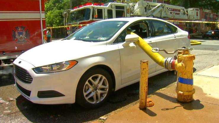 car blocking fire hydrant