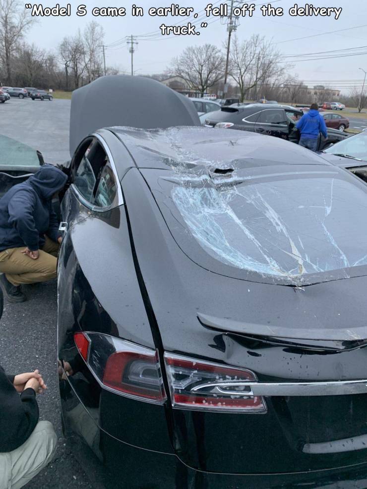tesla fell off truck - "Model S came in earlier, fell off the delivery truck."