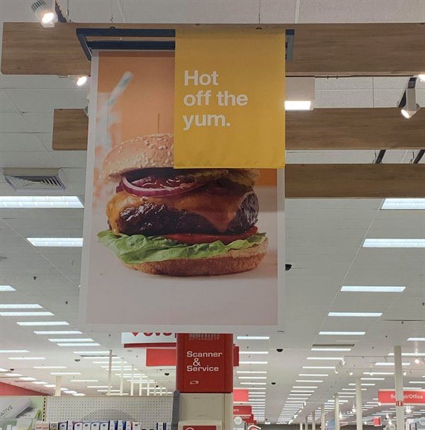 Hot off the yum burger advertisement