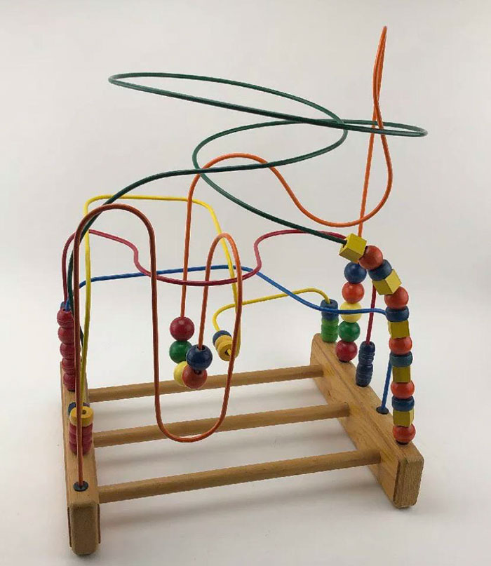 wooden toy with wires doctors office