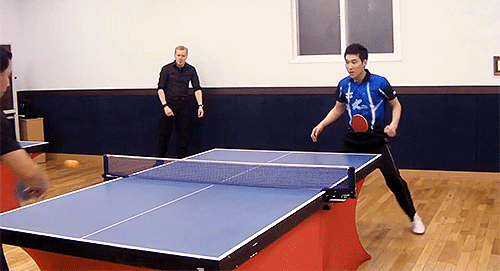 ping pong gif paddle in guy's waist band
