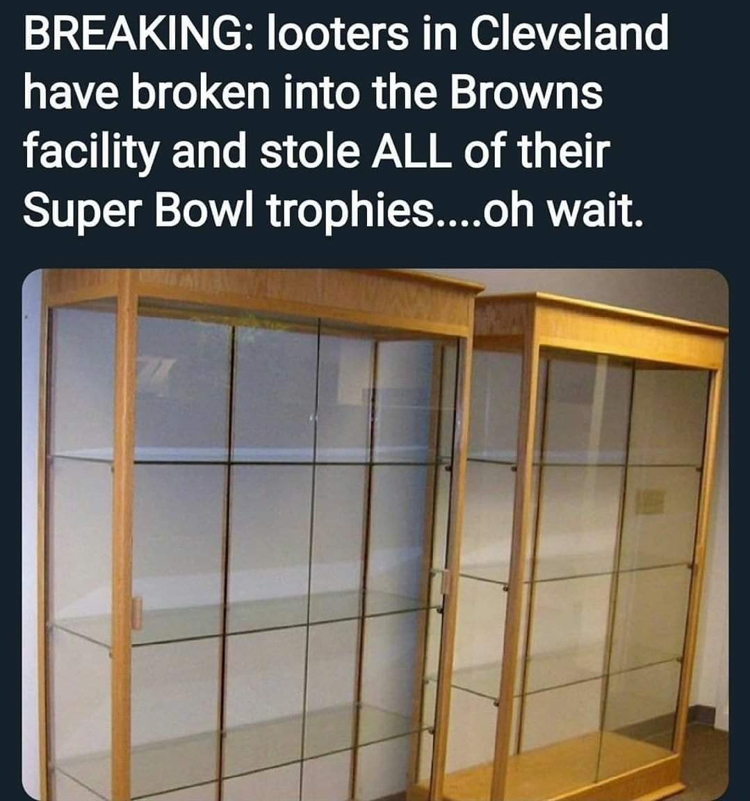 display case - Breaking looters in Cleveland have broken into the Browns facility and stole All of their Super Bowl trophies....oh wait.