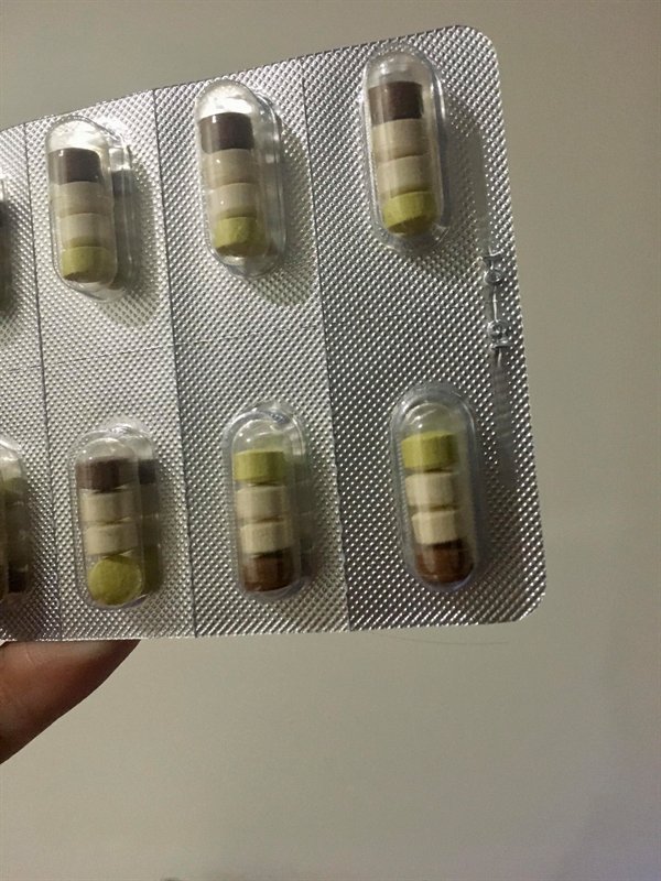 pills that look like the colors of the animated character shrek