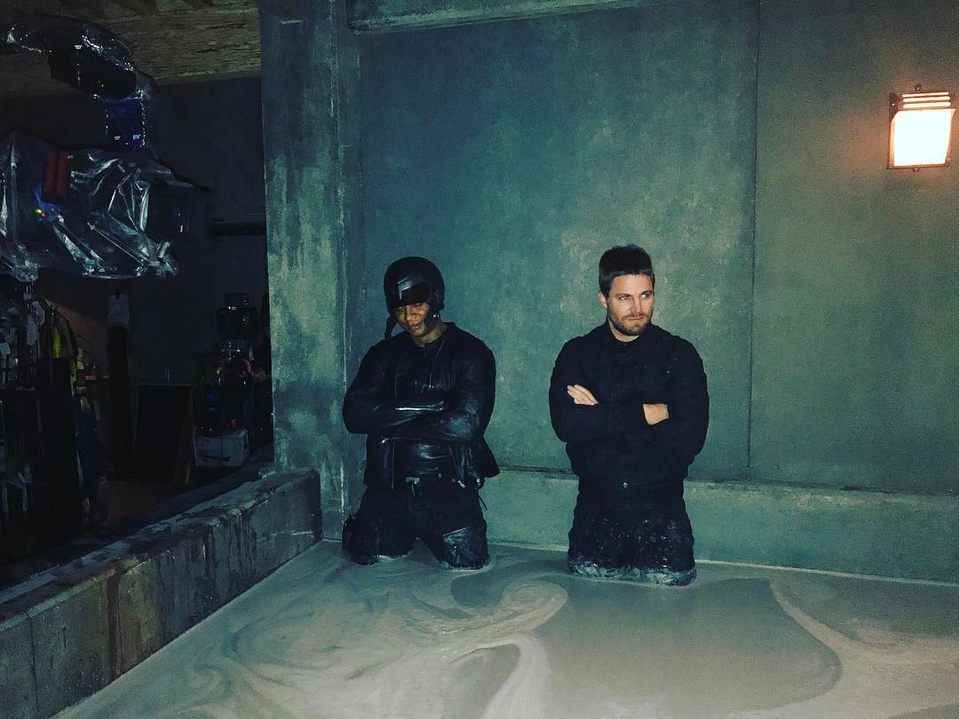 David Ramsey and Stephen Amell are in the water on the set of Arrow.