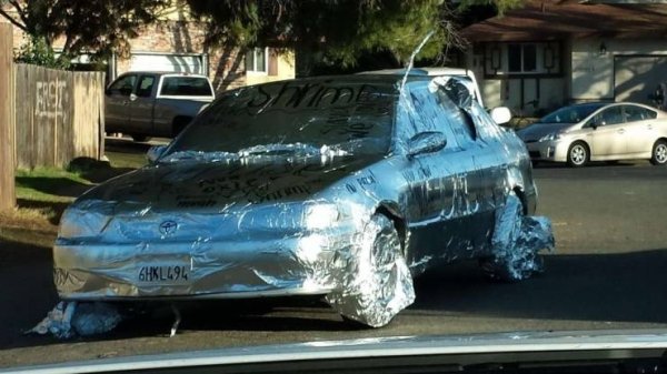 car wrapped in tinfoil aluminum foil