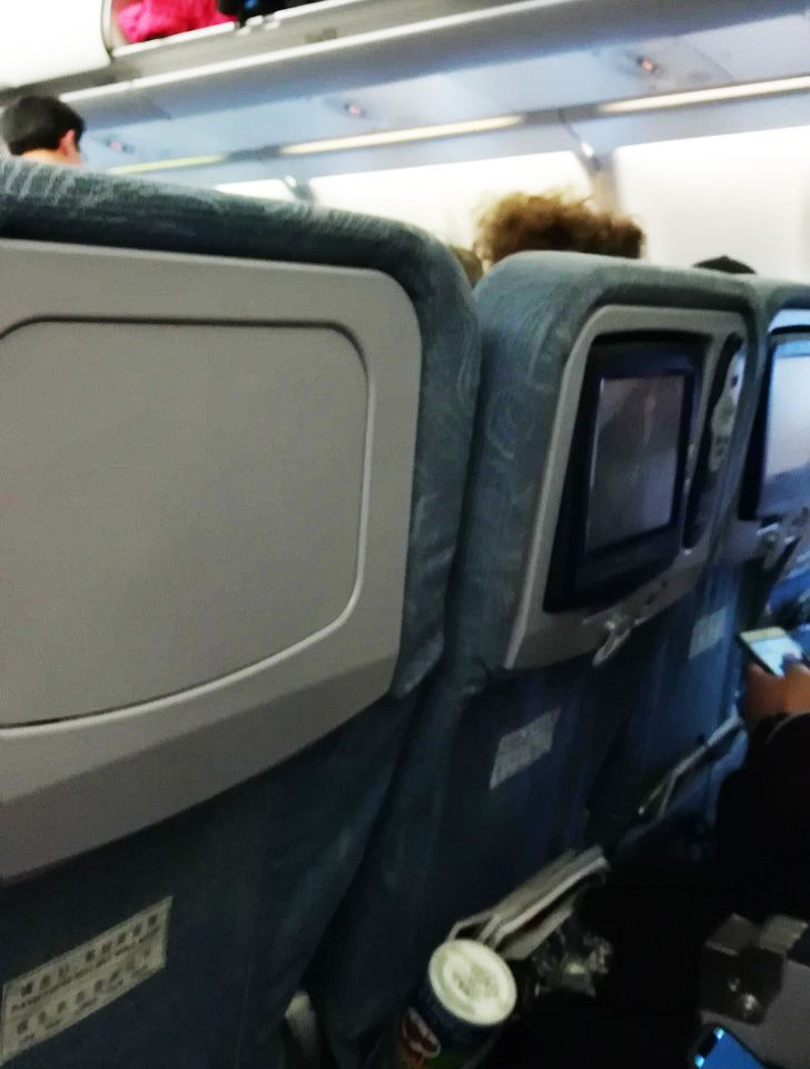 airplane seat headrest with no screen on it
