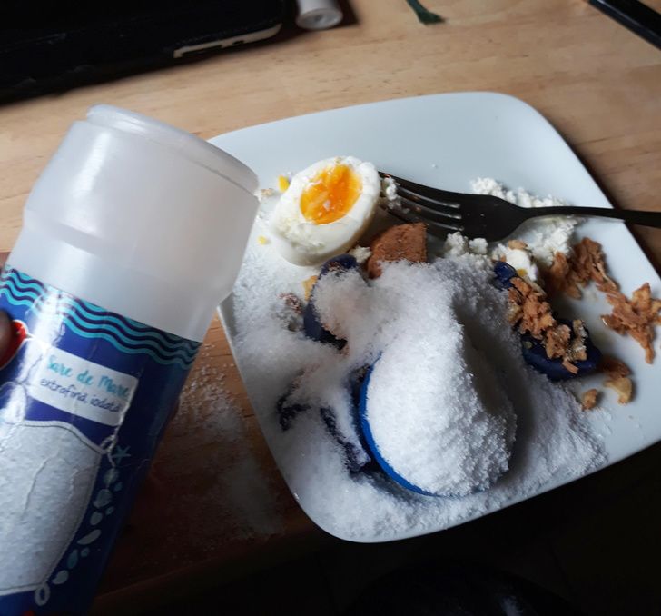 salt container lid fell off and spilled salt all over food