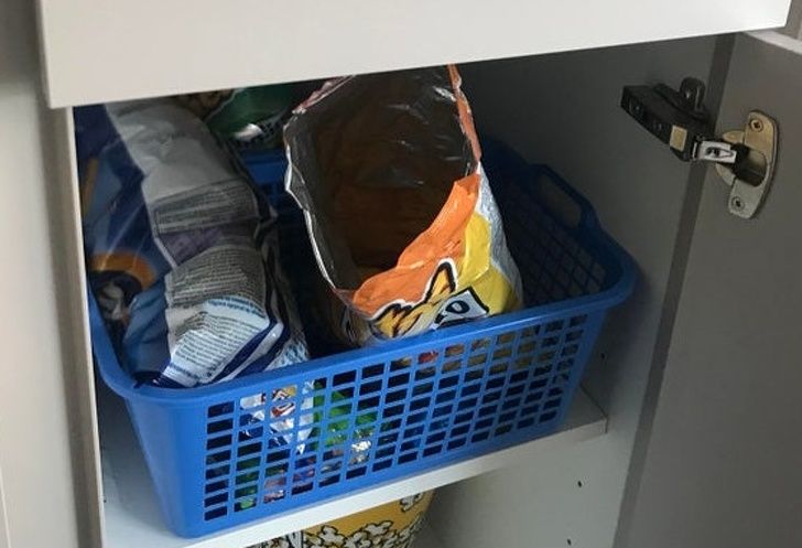 bag of cheetos left open inside the cupboard