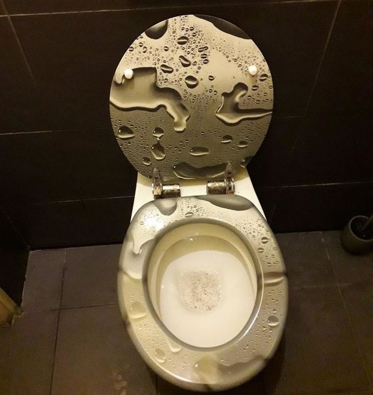 toilet with weird water droplets design on it