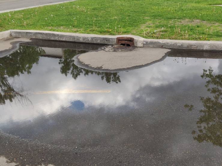 drain fail rain puddle