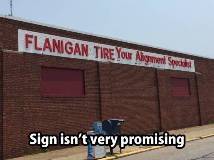 Flanigan Tire Your Alignment Specialist Sign isn't very promising