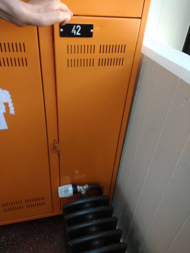 locker door stuck behind pipe