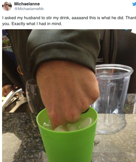 husband stirring wife's drink with his fingeres