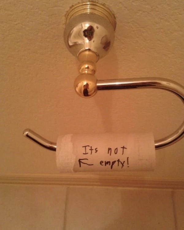 toilet paper roll that says it's not empty