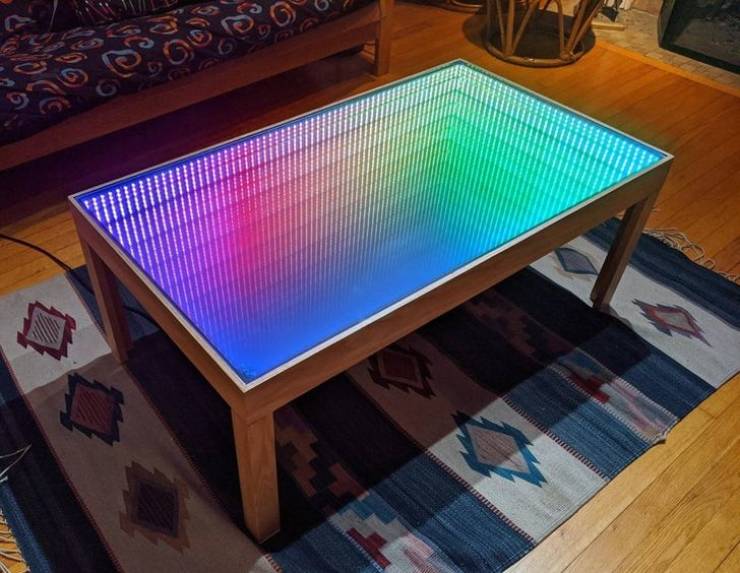 A programmable LED infinity mirror coffee table