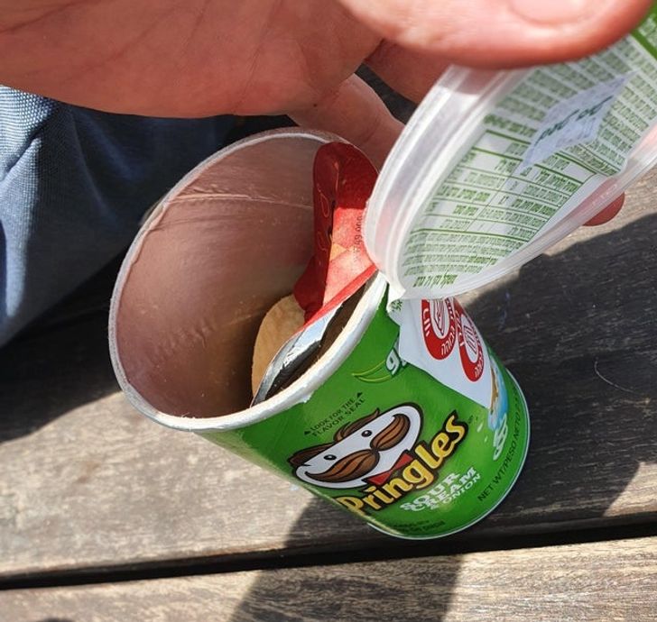 pringles sticker to prevent lid from falling inside the tube