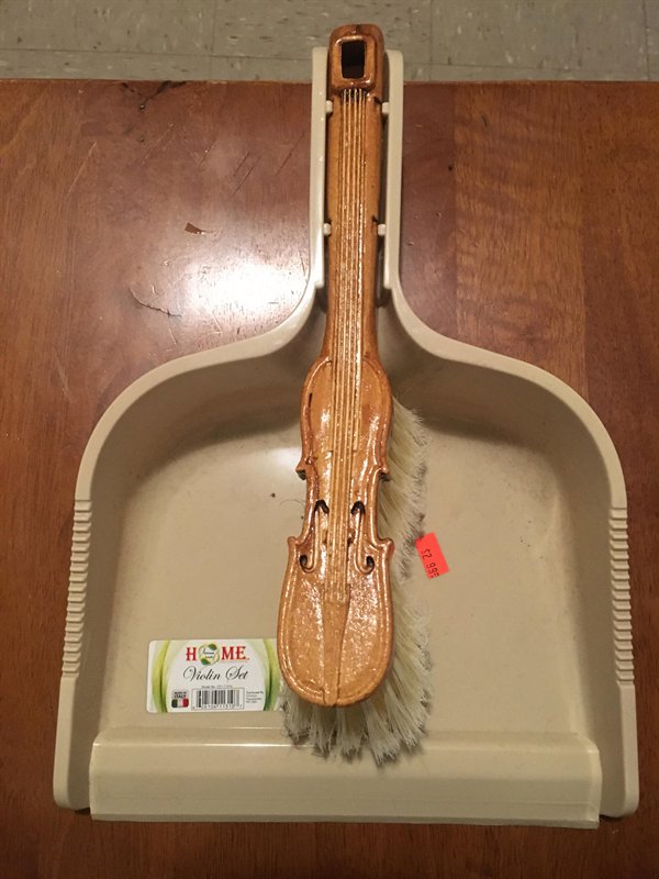 dustpan brush shaped like a violin