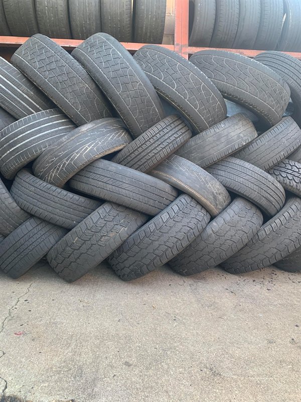 tires stacked neatly on an angle