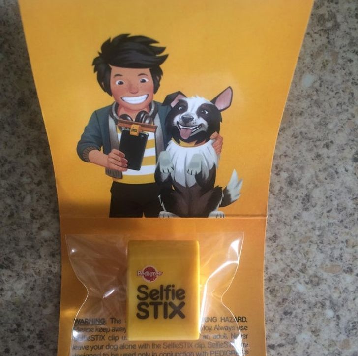 Design Twist - Pedigree Selfie Stix Warning The Ung Hazird sepse keep away cy. Always se Stix clip adull. Nr leave your dog alone with the Selfie Stik clip Selles Innly in munction with Pedigre