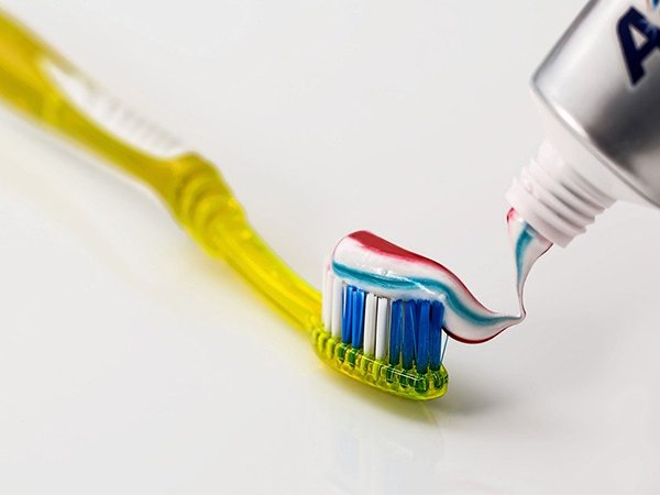 toothpaste on toothrush