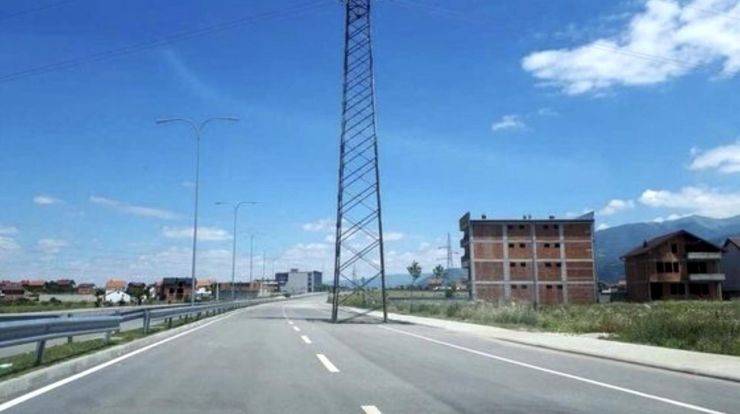 tower in the middle of the road