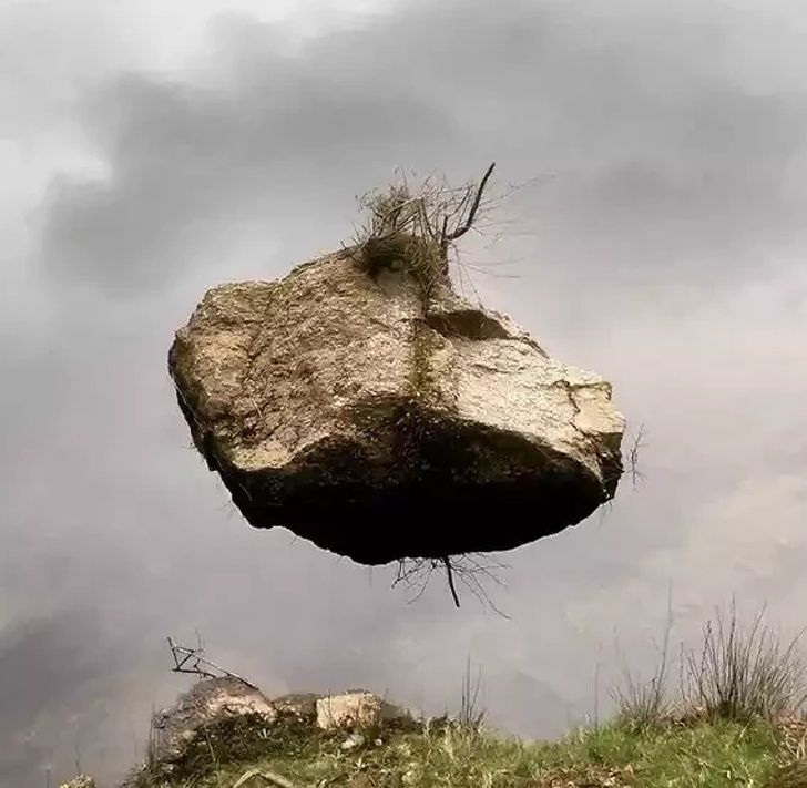 Looks like a floating rock but it’s just a rock on water.