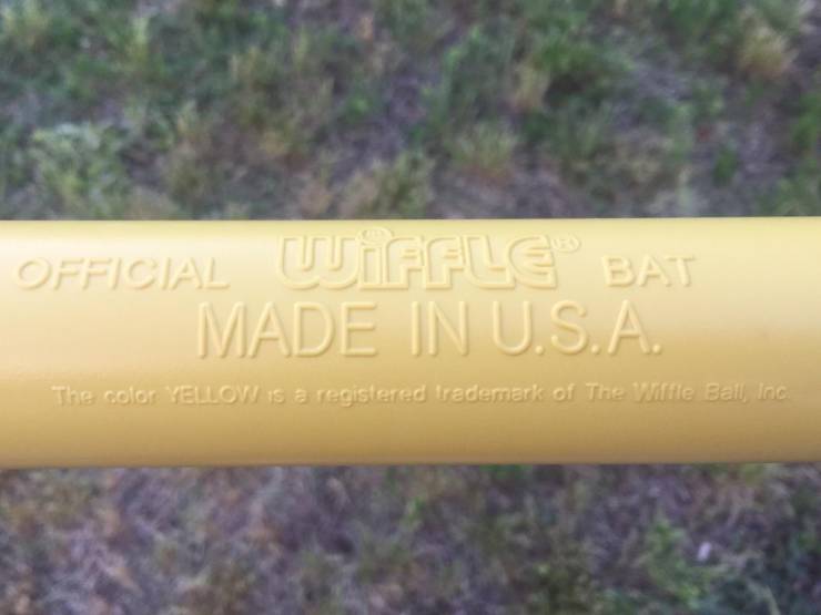 “The color YELLOW is a registered trademark of The Wiffle Ball Inc.”